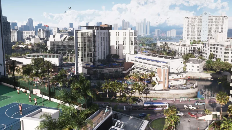Vice City von oben: Hochhäuser, Palmen, ein Kanal und links ein Basketballplatz. Bild: Rockstar Games