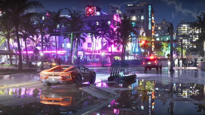 Nachtstraße vor dem Ocean View Hotel mit Hotel Dixon, Leihrollern und Polizeiwagen. Bild: Rockstar Games, via Insider Gaming