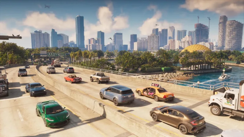 Highway bei Tag mit Skyline, dichtem Verkehr und Schildern zum Vice City Oceanarium. Bild: Rockstar Games, via Insider Gaming